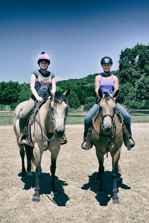 Horseback riders at The Texas Riding camp located at the Hill Country Equestrian Lodge